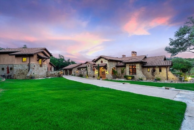 view of front of property with a yard