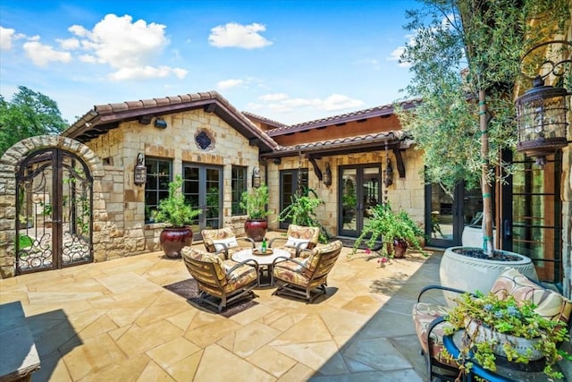 view of patio featuring french doors