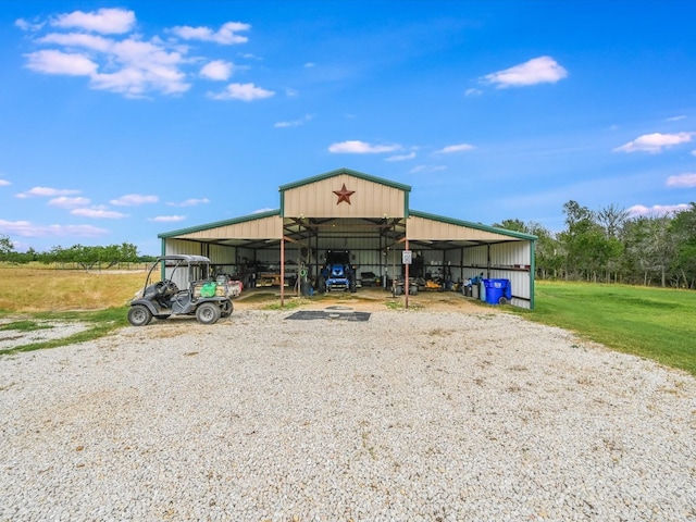 view of outdoor structure featuring a yard