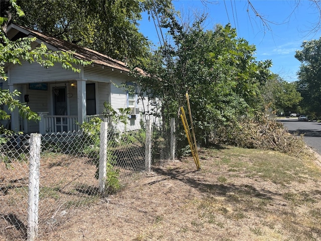 view of yard with covered porch