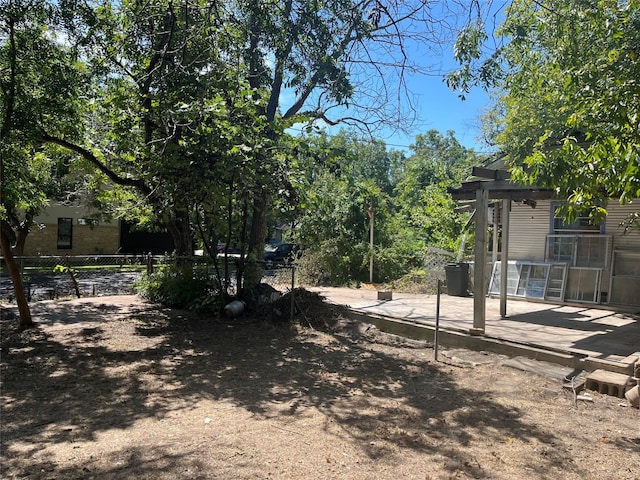 view of yard with a wooden deck