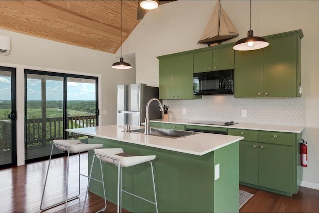 25633 Pedernales Point Dr, Spicewood, TX 78669 - kitchen featuring black appliances, green cabinetry, wooden ceiling, dark wood finished floors, and light countertops