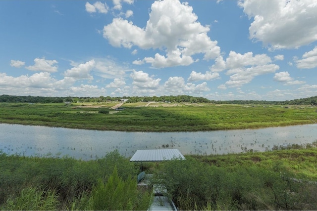 view of water feature with a rural view