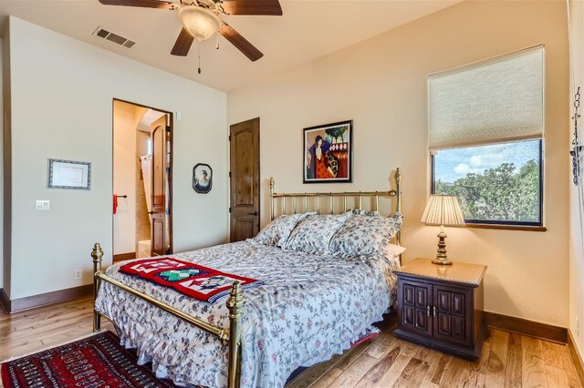 bedroom featuring ceiling fan and light hardwood / wood-style floors