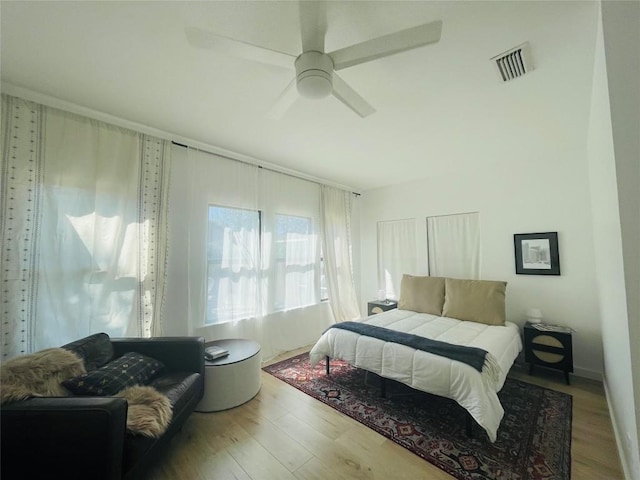 bedroom featuring wood-type flooring