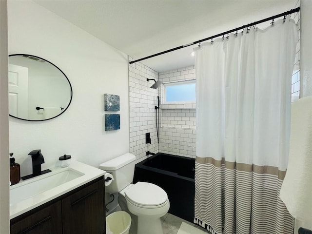 full bathroom with vanity, shower / bath combination with curtain, and toilet