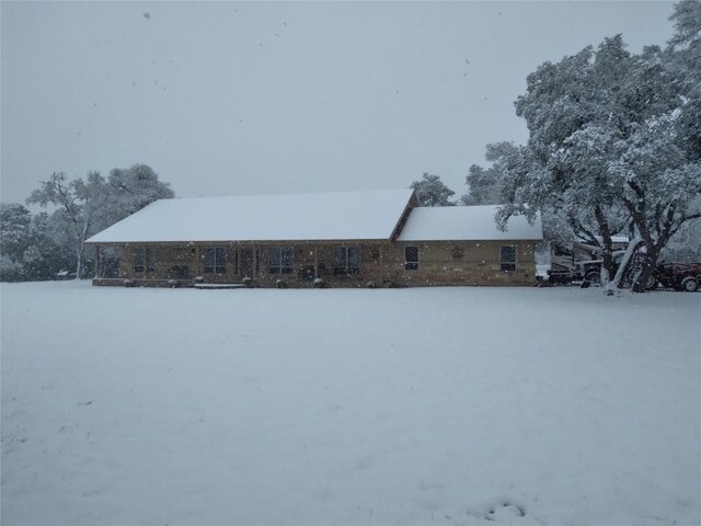 view of yard covered in snow