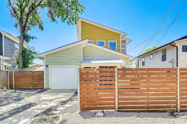 view of front of property featuring a garage