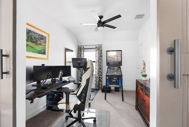 office area featuring lofted ceiling, ceiling fan, and carpet