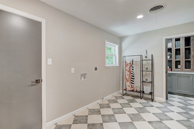 laundry area with washer hookup and electric dryer hookup