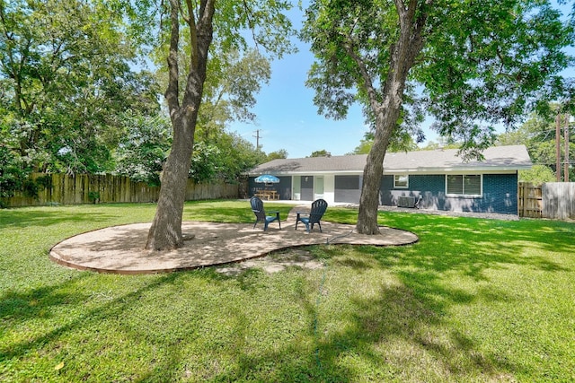 view of yard with a patio area