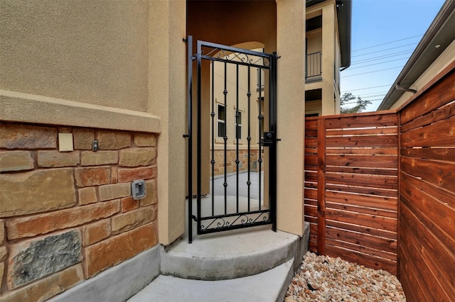 entrance to property featuring a balcony