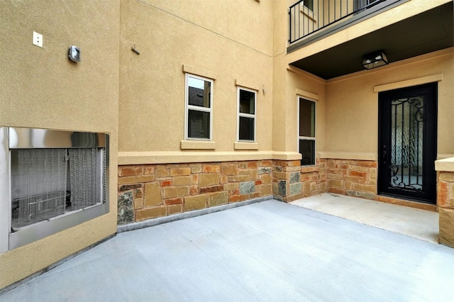 view of patio / terrace featuring a balcony