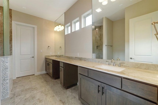 bathroom with tile patterned floors and double vanity