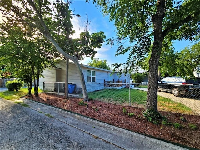 view of property exterior featuring fence