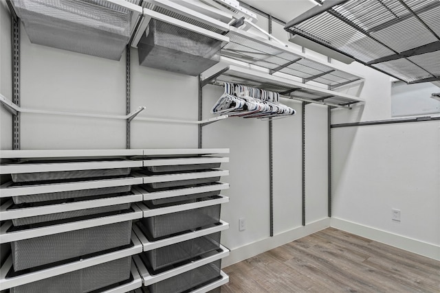 5110 Sioux Ln, Austin, TX 78734 - walk in closet featuring wood finished floors