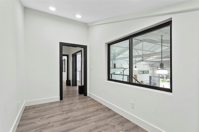 hallway featuring hardwood / wood-style floors