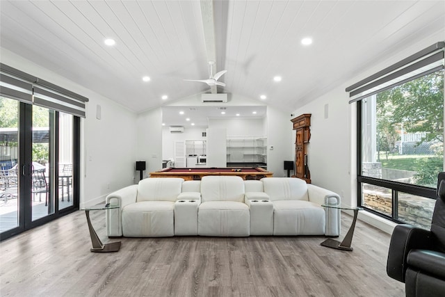 home theater room featuring wooden ceiling, light hardwood / wood-style flooring, ceiling fan, and a healthy amount of sunlight