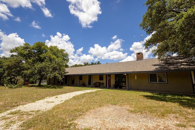 single story home featuring a front yard