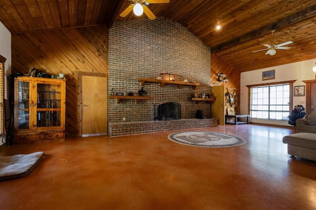 unfurnished living room with wood walls, wooden ceiling, high vaulted ceiling, a fireplace, and beam ceiling