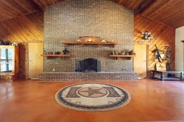 unfurnished living room featuring a brick fireplace, high vaulted ceiling, and wood walls