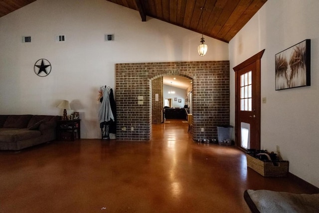 living room with concrete flooring, high vaulted ceiling, wooden ceiling, and brick wall