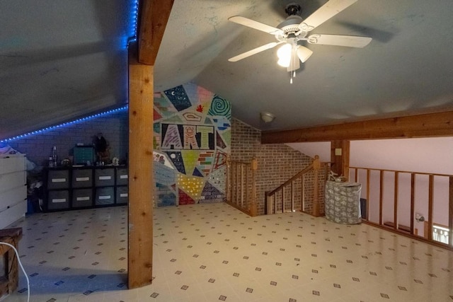 bonus room with vaulted ceiling and ceiling fan