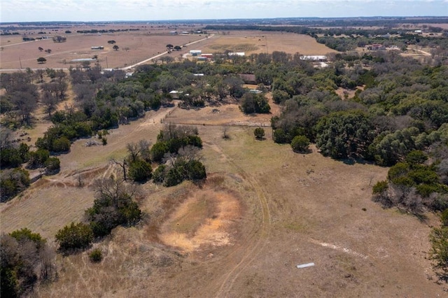 birds eye view of property featuring a rural view