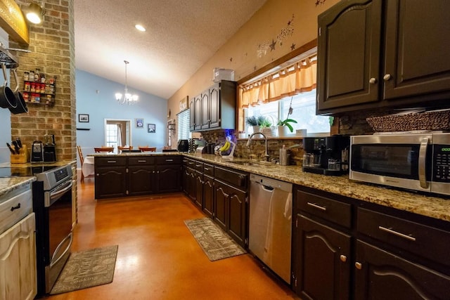 kitchen with sink, a healthy amount of sunlight, stainless steel appliances, vaulted ceiling, and a textured ceiling