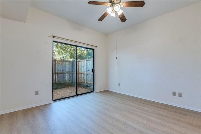 spare room featuring ceiling fan and light wood-type flooring