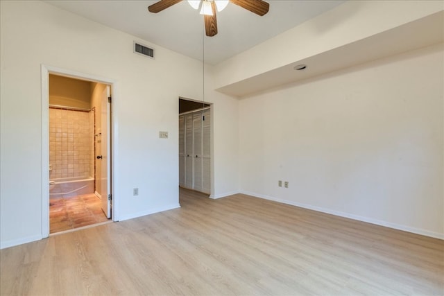 unfurnished room featuring ceiling fan and light hardwood / wood-style flooring