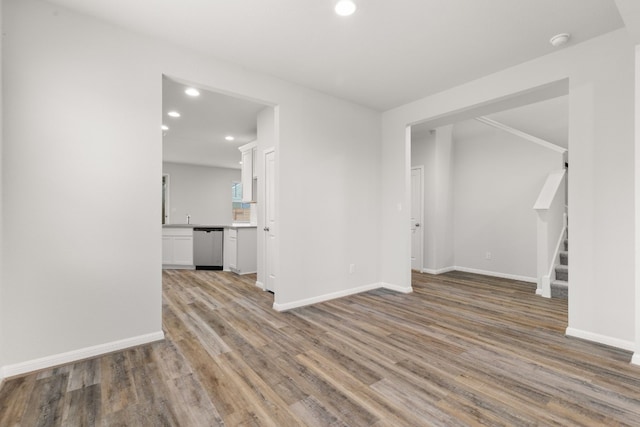 empty room with hardwood / wood-style floors