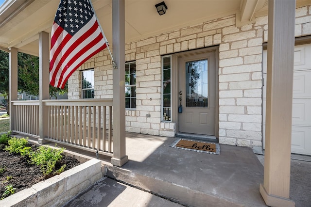 entrance to property with a porch