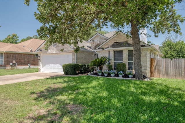 single story home featuring a garage and a front lawn