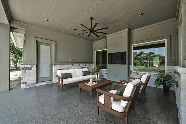 view of patio / terrace featuring an outdoor living space and ceiling fan