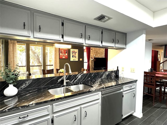 kitchen with dishwasher, dark hardwood / wood-style floors, sink, and gray cabinets