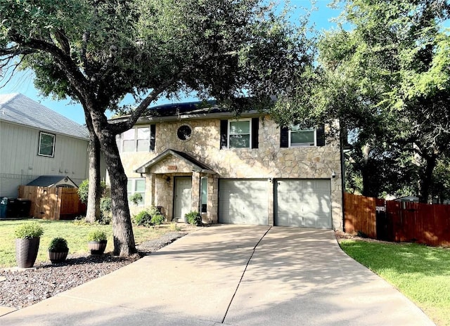 13242 Kerrville Folkway, Austin, TX 78729 - view of front of home featuring stone siding, driveway, and a garage