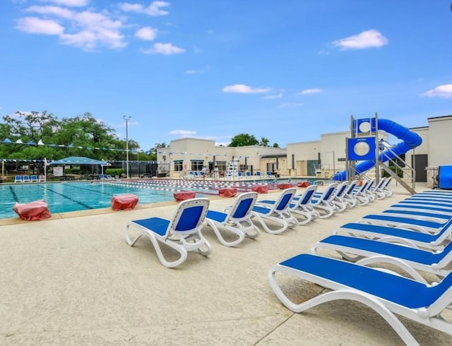 13242 Kerrville Folkway, Austin, TX 78729 - community pool with a patio