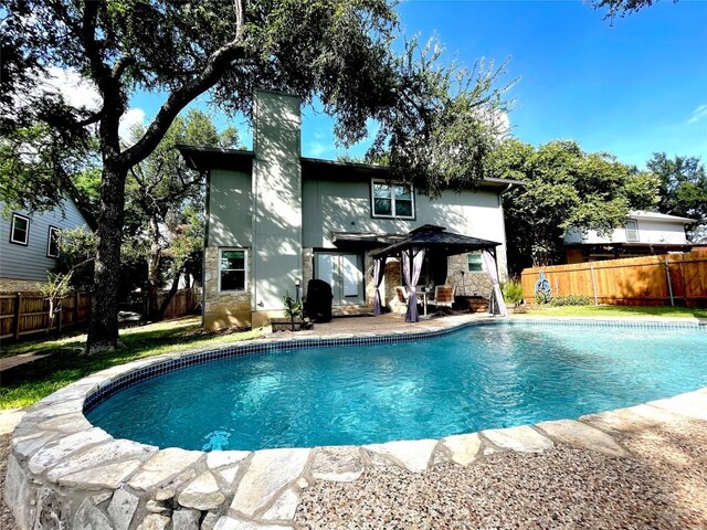 view of pool featuring a patio area