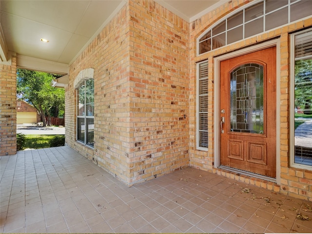 doorway to property with covered porch