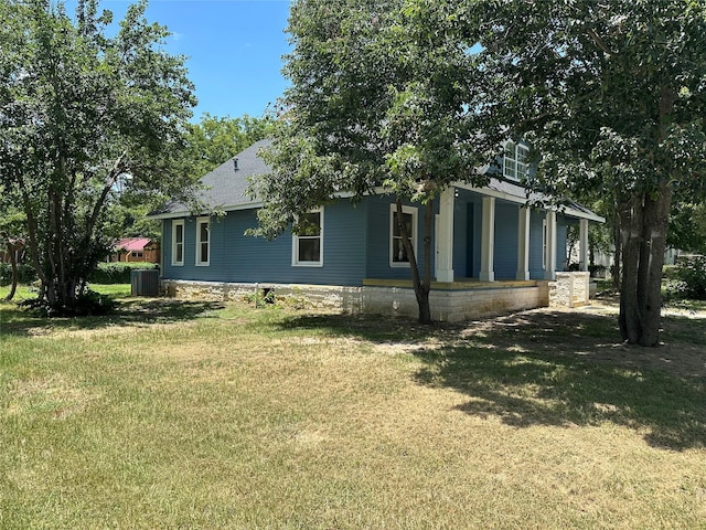 view of property exterior with a yard