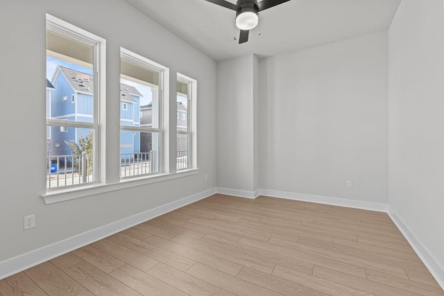 unfurnished room with ceiling fan and light hardwood / wood-style flooring