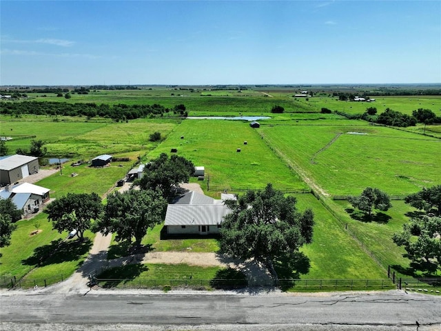 birds eye view of property featuring a rural view