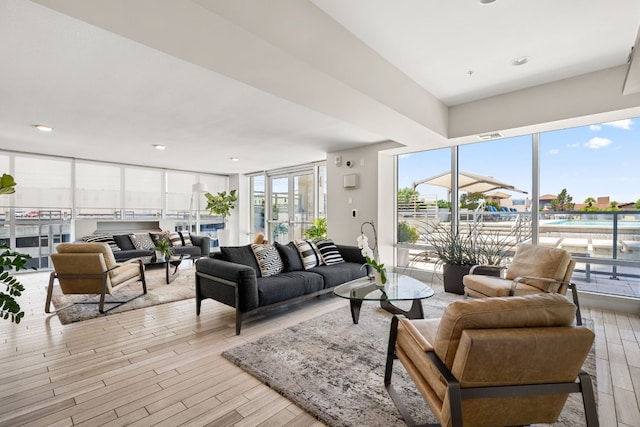 living room with light hardwood / wood-style floors