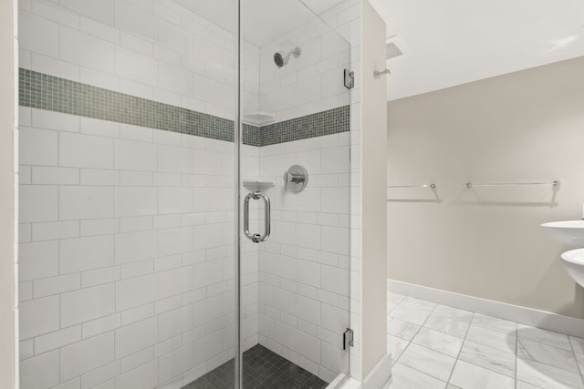 bathroom with walk in shower