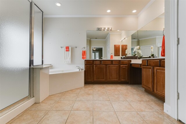 bathroom with vanity, ornamental molding, tile patterned floors, and separate shower and tub