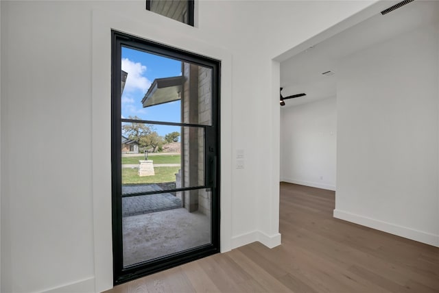 doorway to outside featuring hardwood / wood-style floors