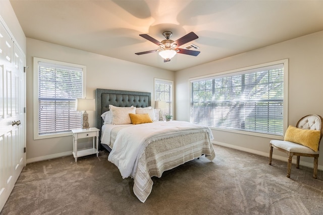 carpeted bedroom with ceiling fan