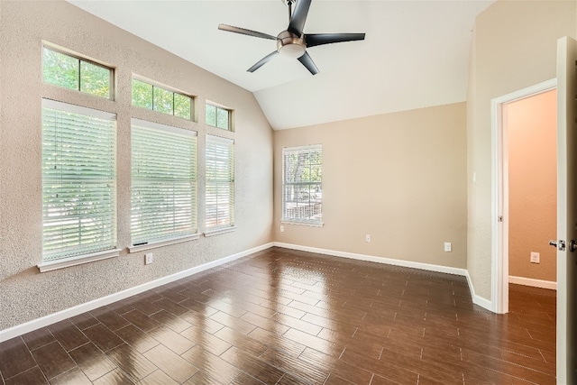 spare room with ceiling fan and vaulted ceiling