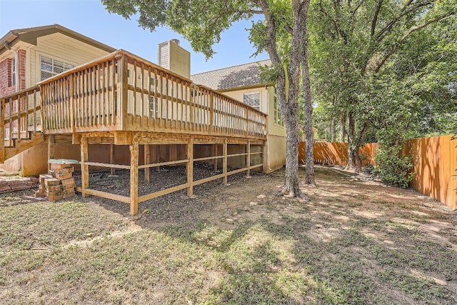 back of house featuring a deck